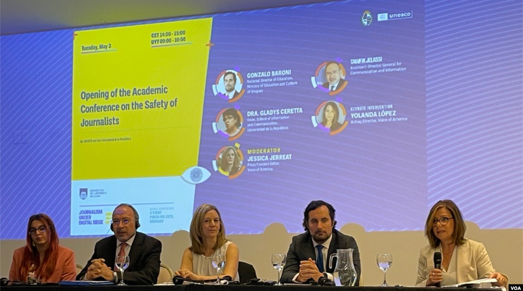 VOA Photo: At the UNESCO conference, a panel moderated by Jessica Jerreat, VOA Press Freedom Editor (Center) with Acting VOA Director Yolanda López (R) delivering the keynote as scholars presented new research.